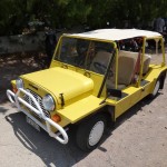 A yellow jeepish type vehicle.  I could live here.